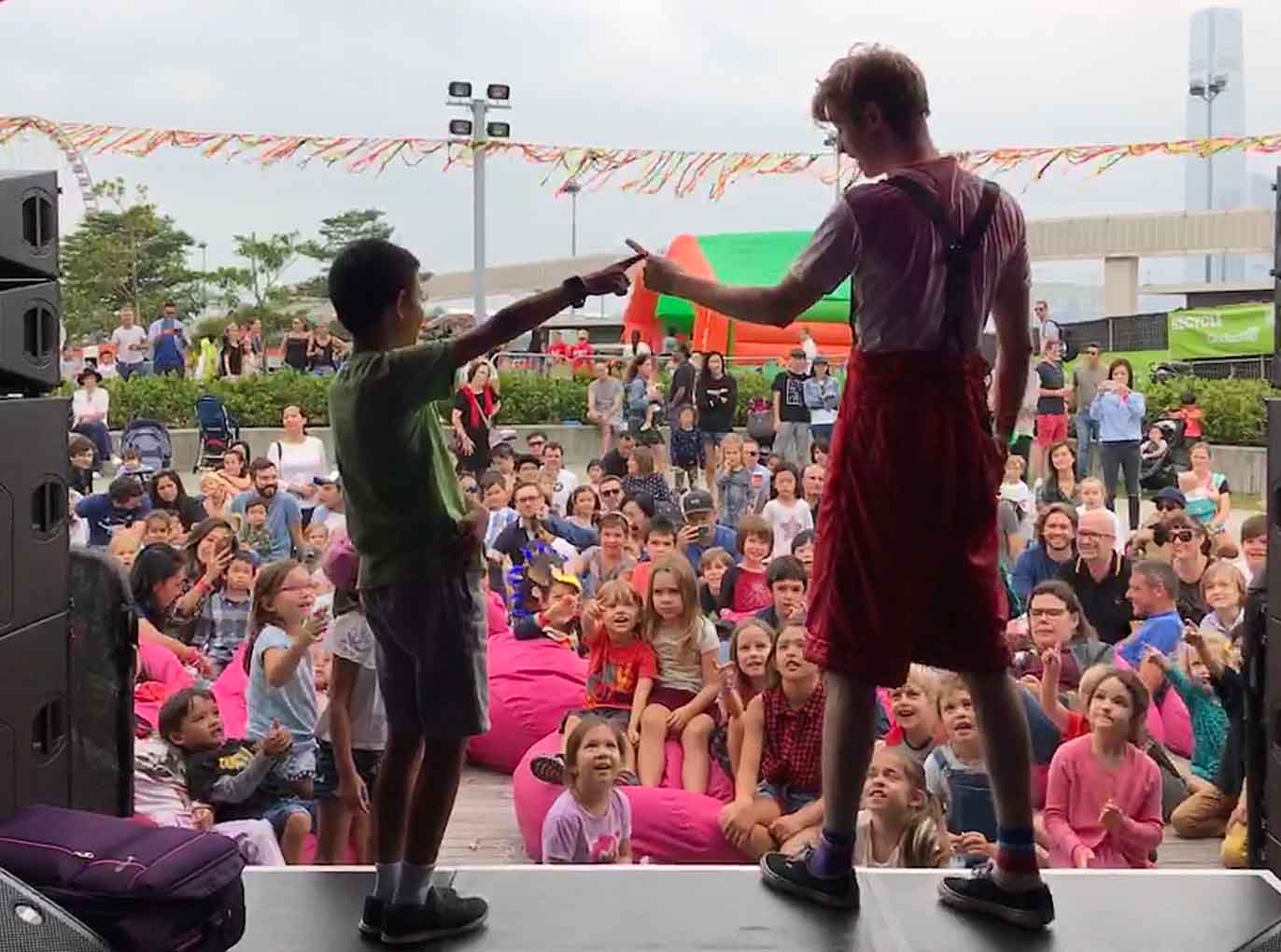childrens entertainer interacting with audience during magic show